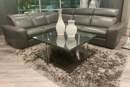 3 Pc. Leather Sectional With Motion