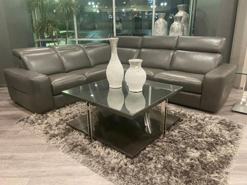 3 Pc. Leather Sectional With Motion