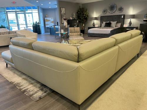 2 Pc. Leather Sectional With Tufted Seats